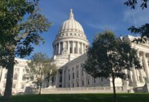 Evers nixes top two income tax breaks, signs budget after 51 partial vetoes