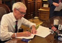 Evers signs budget as guv, lawmakers beat reconciliation bill across finish line